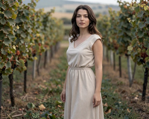 Elegant modest Moldovan woman in natural vineyard setting